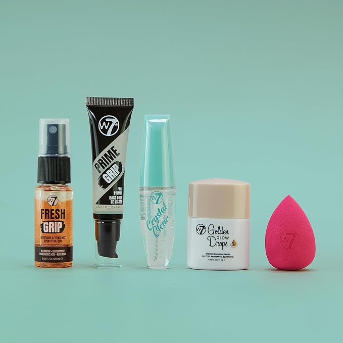 W7 On the Go Essentials Set - Mini Makeup Must-Haves with Primer, Setting Spray, Mascara, Golden Glow Bronzing Drops & Beauty Sponge - Travel or Handbag Size Essentials