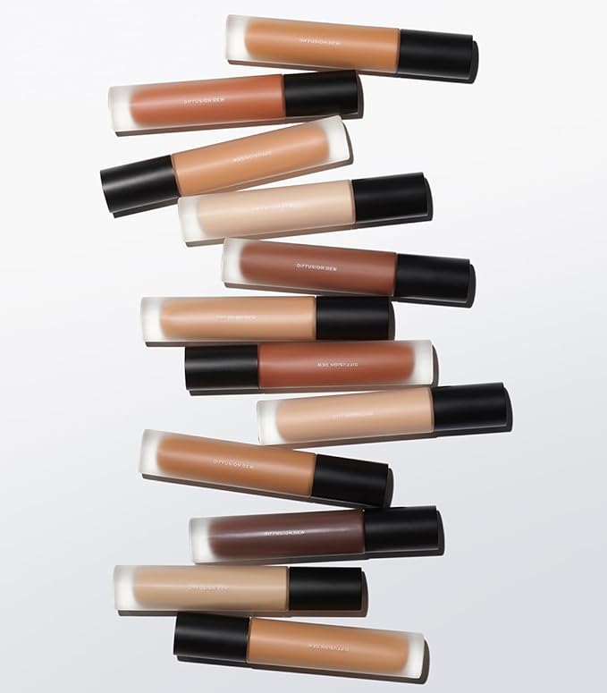 MAKE Beauty Diffusion Dew Skin Tint. Sheer to Medium Coverage Radiant Finish. Blurring, Smoothing, and Brightening for Glowing Complexion. Enhanced with Niacinamide and Adenosine. Hazelnut 16